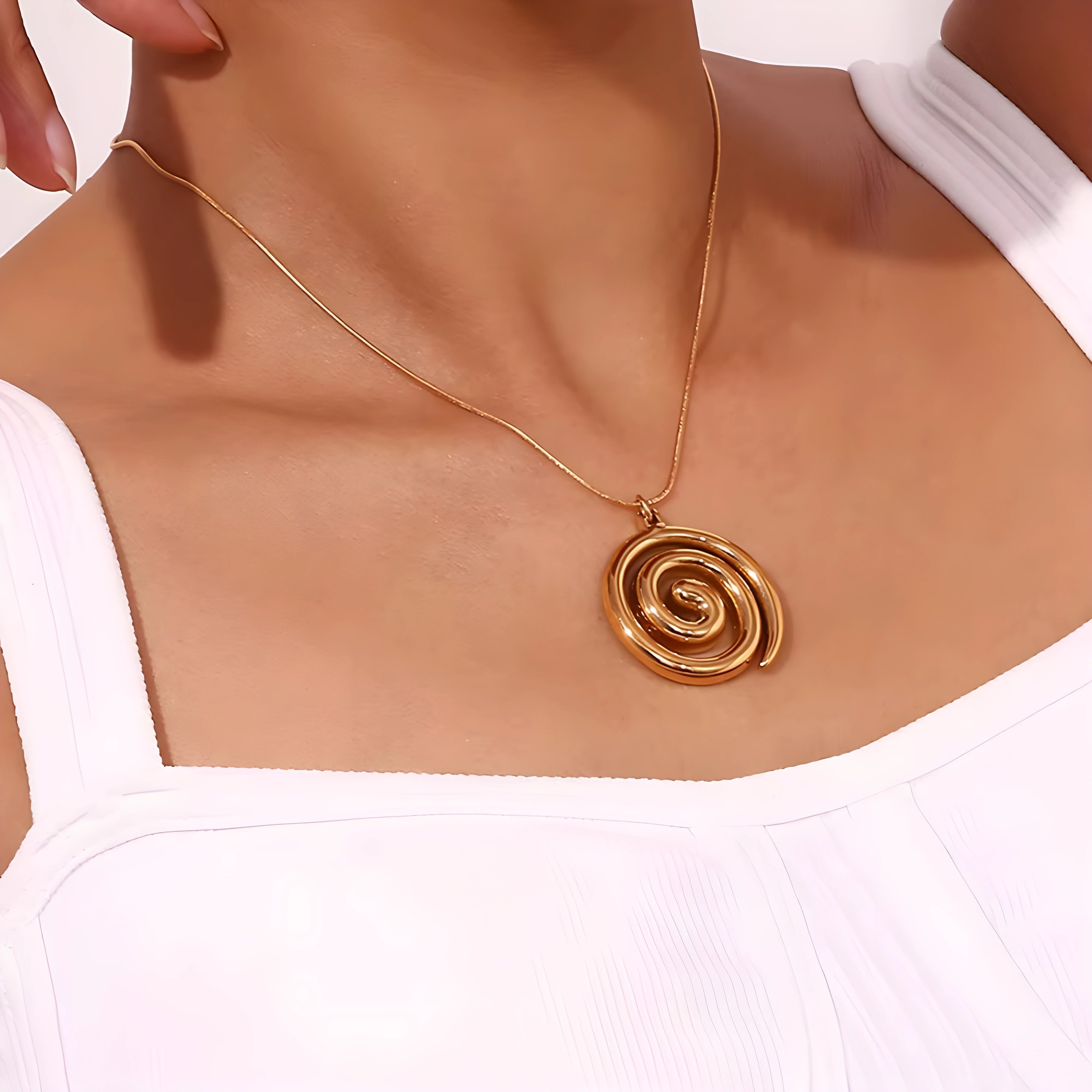 Sidonie – Goudkleurige spiraalhanger